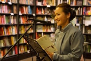 Uuganaa reading at the Glasgow launch